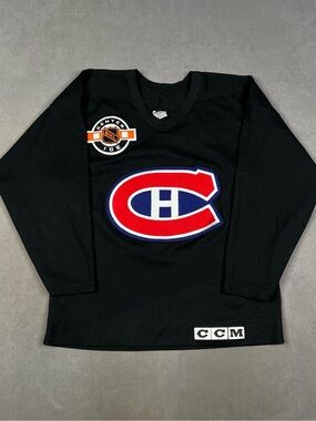 Vintage CCM Black Hockey Jersey with Red & Blue Crest